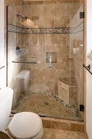 Furnish your small bathroom with a wall mounted or pedestal sink to open up space for a walk in shower. Shower Stalls For Small Bathroom With Seat Bathroom Remodel Shower Small Bathroom Tiles Shower Remodel