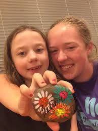 Who painted the rock found in a tree?