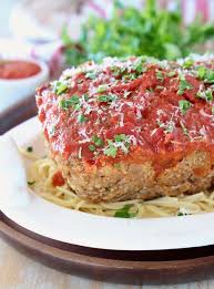 Italian Sausage And Ground Beef Are Combined With Italian Herbs Parmesan Ricotta Cheese In The Best Italian Meatl Italian Meatloaf Meatloaf Italian Sausage