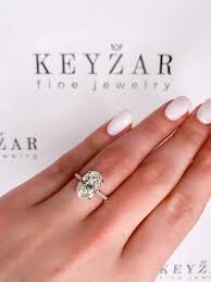 2 ct oval solitaire engagement ring hidden halo oval ring oval cut engagement ring elongated oval wedding ring hidden halo diamond ring csdesignscreations 4.5 out of 5 stars (67) sale price $78.20 $ 78.20 $ 92.00 original price $92.00 (15% off. 3 5 Carat Oval Engagement Ring Hidden Halo Moissanite Etsy Gold Oval Engagement Ring Engagement Rings Oval Moissanite Engagement Ring Oval