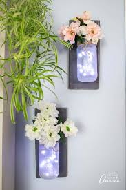 Glittery goblets are the perfect holders for delicate candles. How To Make Mason Jar Wall Sconces Crafts By Amanda