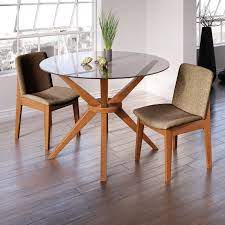 The inherent reflective and transparent qualities found in glass mean that it will reflect and complement its surroundings. Blending Thought Provoking Design And Symmetrical Style This Dapper Dining Table Lends Mid Glass Dining Room Table Glass Round Dining Table Glass Dining Table