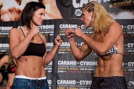 Carano began her training with muay thai to competitive mma, where she competed in strikeforce and elitexc. Face Off From Before The Gina Carano Vs Cristiane Cyborg Santos Mma Bout Mma Women Female Mma Fighters Ufc