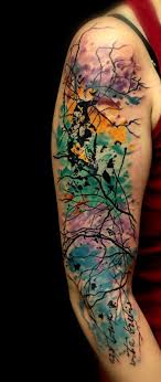Watercolor face painting tattoo on leg. 75 Striking Watercolor Tattoo Inspirations Godfather Style