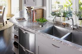 A laminate countertop can easily support an undermount sink. Laminate Countertops Love Undermount Sinks
