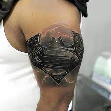 Super man ripped skin logo tattoo on chest. Updated 45 Heroic Superman Tattoos August 2020