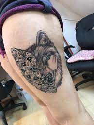 קעקוע זאב מנדלה על ירך Tattoo Artists Tattoo Teacher Artist Tattoos