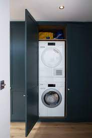 My washer and dryer are in my bathroom. 31 Creative Ways To Hide A Washing Machine In Your Home Digsdigs