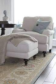 This chair is dressed in beige linen upholstery and graced by a stately modified. Barrie Residence Living Room Chairs Home Comfy Chairs