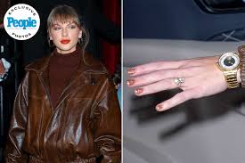 Taylor Swift Pairs $3K Leather Coat with Sparkling Engagement Ring for Night  Out (Exclusive)
