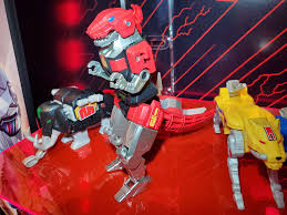 Super sentai is a series about a group of colorfully dressed superheros fighting extravagant villains with special effects and robots. New York Toy Fair Hasbro Buildable Mighty Morphin Dino Megazord On Display Tokunation