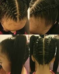 Nerdy double ponytail hairstyle for curly hair Braids Into Two Ponytails Twist Braid Hairstyles Braided Ponytail Hairstyles Easy Hairstyles