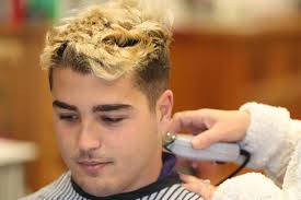 Closing a chapter.' CCU linebacker cuts off bleached mullet for a good  cause