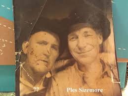 Does anyone know who the man to the left is? The man