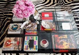 Coffee table books span many different genres, but some of the most common topics include art, fashion, travel and photography. Vogue Coffee Table Vignette Clear Table Cassina 4 Sections Books Flowers Objects Cococozykkkk Brabbu Design Forces