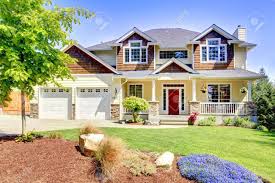 The ahren's key design features: Large American Beautiful House With Red Door And Two White Garage Doors Stock Photo Picture And Royalty Free Image Image 14615284