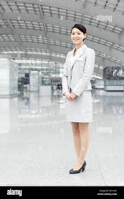 Female airport staff member in airport ...