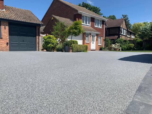 Resin bound surfaces offer a seamless, puddle-free finish due to their highly permeable nature., AI generated