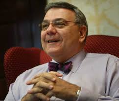 SHU's interim president has experience behind bow tie
