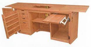 It makes use of what would otherwise be an underutilized area. Jake 39 S Amish Furniture 165 Sewing Cabinet With Serger Lift Open Sewing Cabinet Sewing Room Furniture Small Sewing Rooms
