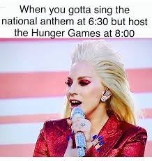 Lady gaga is pulling double duty for her third appearance on saturday night live. Pin By Toxic Glam On Lady Gaga Hunger Games Singing The National Anthem Ghetto Red Hot