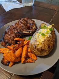 Dump corn or potato starch on to a shallow dish. Homemade New York Steak Baked Potatoes And Roasted Carrots Food
