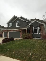 Red vinyl siding with brick. Dark Gray Siding With Red Brick Novocom Top