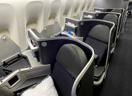 While it isn't clear what started the encounter, a maskless woman is captured on video screaming at the passengers around her. Review American Airlines 777 200 Business Class One Mile At A Time