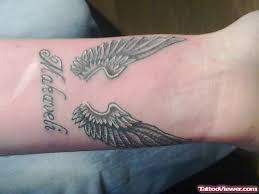 This particular design is not only on the upper back but also makes two designs like these are very subtle and discreet and make for great wrist tattoos. Awesome Grey Ink Angel Wings Tattoos On Wrist