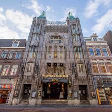 A beautifully eclectic mix of architectural styles. Pathe Tuschinski Filmalpha Nl