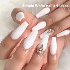 The simple white nail designs will make your hands more refined and that will give your image of lightness and grace. 30 Simple Trending White Nail Design Ideas 1 Nailarts Rhinestone Nails White Coffin Nails Matte White Nails