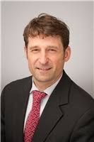 Mr. Keith E. Glidden