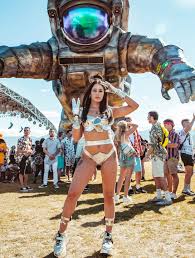 The only wonderland where a crochet halter top and a leather chaps skirt make for an appropriate outfit. Craziest Coachella Outfits Ever Including A Beer Can Dress And Pompom Bikini