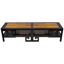All our tables are hand made to order in the most exclusive metals, exotic woods, marbles and italian venetian glass as well as architectural macassar ebony wood. Michael Taylor For Baker Rosewood Black Greek Key Asian Long Coffee Table For Sale At 1stdibs