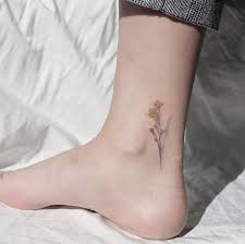 Birth Year Tattoo Designs Ankle 22 Beautiful And Delicate Freesia Tattoo Designs Tattooadore Ankle Tattoo Designs Floral Tattoo Design Birth Flower Tattoos