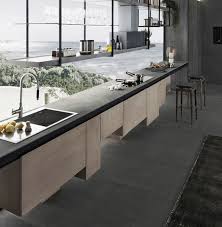 Sustituir encimera de aglomerado (imitación granito) por encimera de madera natural (pino) y tratarla. 17 Cocinas Modernas Con Encimera De Cemento