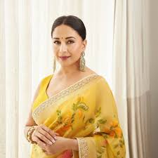 Madhuri Dixit Nenes yellow Anita Dongre sari was handwoven in Varanasi |  Vogue India