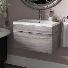 A floating bathroom vanity allows you to store additional items underneath, via baskets. Ivy Bronx Hewlett 24 Wall Mounted Single Bathroom Vanity Set Reviews Wayfair