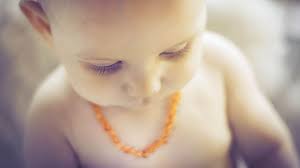 The Natural Mama S Guide To Amber Teething Necklaces