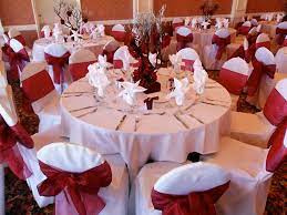 white chair covers available for rent with candy apple red bows in burbank special event lin red wedding decorations apple red wedding red and white weddings