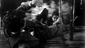STRANGERS ON A TRAIN — The Beacon
