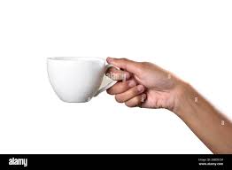 Hand holding tea cup