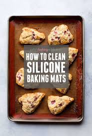 Silicone Baking Mat Being Cleaned In Sink