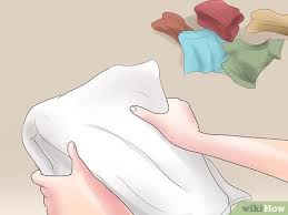 Use half the amount of detergent you'd normally use. How To Wash Towels With Pictures Wikihow