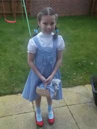Homemade Dorothy From Wizard Of Oz Cheap Material And Easy Accessories Make A Cute Dress Up Outfit Perfect For World Book Day Easy Book Week Costumes Book Week Costume Fancy Dress