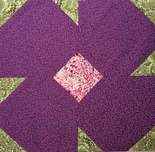 My Violet Flower Block Each Suffragette Was Given A Posy Of Violets By Her Fellow Suffragettes As She Was Released From J Quilt Blocks Violet Flower Quilts