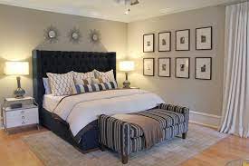 Tufted Navy Headboard And Contemporary Accessories In Master Bedroom Blue Bedroom Ideas For Couples Couples Master Bedroom Woman Bedroom