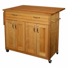 Home styles promo cart features a solid wood construction in a natural finish, easy open utility drawer on metal glides, and double door storage cabinet with an adjustable shelf, paper towel holder, and locking casters. Drop Leaf Kitchen Islands Carts Hayneedle