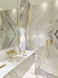 Amelia Carter Interiors Luxury Marble Bathroom With Bathroom Fittings In Brass London Lavatory Faucet Luxury Powder Room Bathtub Design