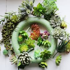 Thread the pipe cleaners of the sign through the grapevine. Faux Succulent Wreath Diy Juggling Act Mama